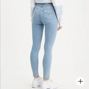 721 High Rise Skinny Jeans
